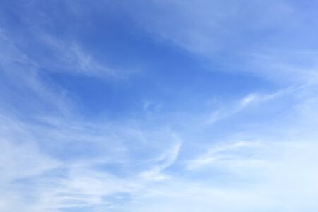 blue sky background texture with white clouds.の写真素材
