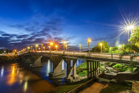 The color of Night traffic light on the road on the bridge (Eka Thot Sa Root Bridge) in Phitsanulok, Thailand.の写真素材