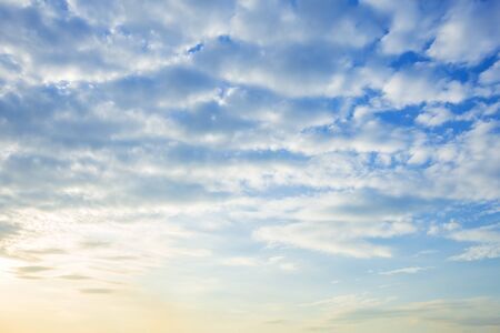 blue sky background texture with white clouds sunset.の写真素材