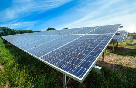 power solar panel on blue sky background,alternative clean green energy conceptの写真素材