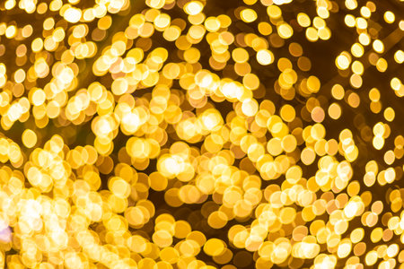 Yellow Colorful light Abstract circular bokeh of Christmas tree background Decoration During Christmas and New Year.の写真素材