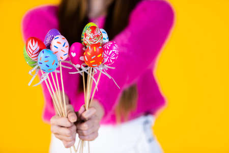 Easter holiday concept,Close up of Happy smile Asian Young woman wearing bunny ears hand holding...