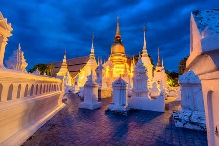 Wat Suan Dok is a Buddhist temple (Wat) at sunset sky is a major tourist attraction in Chiang Mai...