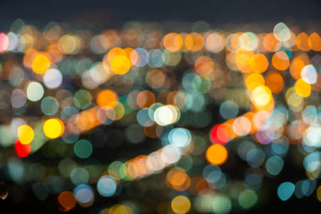 Colorful light Abstract circular bokeh of the city at night background.の写真素材