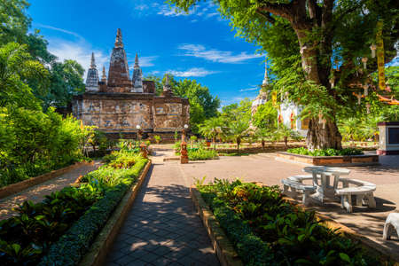 Bokeh Light shadow of solar eclipse on floor at Wat Chet Yot, seven pagoda temple It is a major tourist attraction in Chiang Mai, Thailand.with evening,Temple in Chiang Mai.21 june 2020の写真素材
