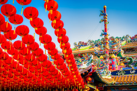 red lantern decoration for Chinese New Year Festival at Chinese shrine Ancient chinese art with the Chinese alphabet Blessings written on it Is a Fortune blessing compliment,Is a public place Thailandの写真素材