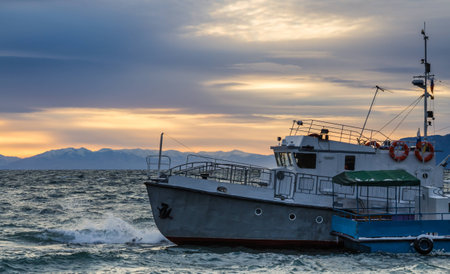 old ship at sunset, Listvyanka, Baikalの写真素材