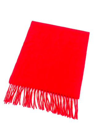Luxurious red cashmere scarf out of pure cashmere wool isolated on white background.の写真素材