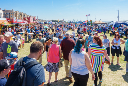 Weston-super-Mare, United Kingdom -  June 17, 2017: People are  walking along the many stalls in Weston-super-Mare during the Airshow 2017のeditorial素材