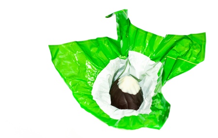 chocolate candy in a foil wrapperの写真素材