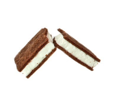 Broken chocolate biscuits on a white background の写真素材