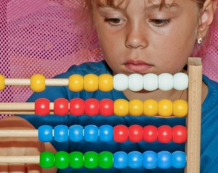 Little Girl with abacus 