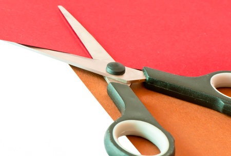 Colorful paper with child s scissors の写真素材