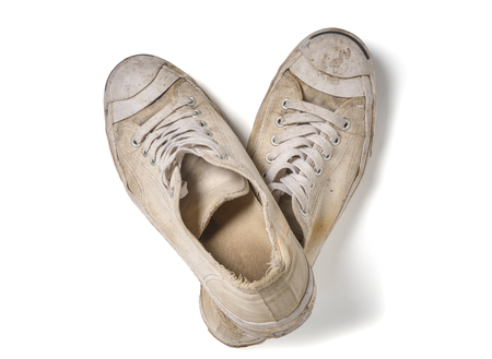 Old white shoes isolateの写真素材