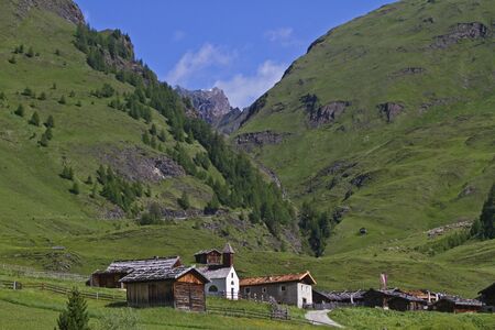 IIdyllic mountain pasture in the Vals Valley in South Tyrolの写真素材