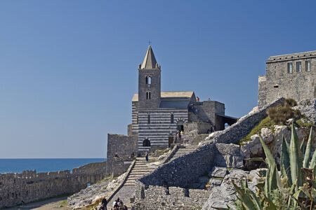 St Simon - the picturesque old church in the Gothic style, stands on the cliffs is the symbol of Portovenereの写真素材