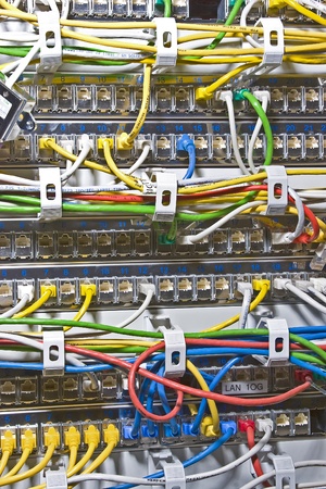 Lots of colorful cord and plug in the network cabinet