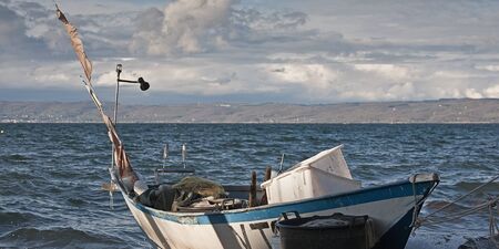 Fishing boats at Marta on Bolsena lakeの写真素材