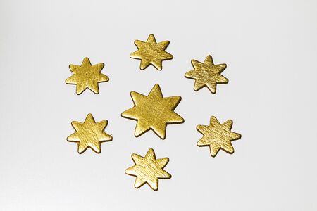 Gold stars on a white background