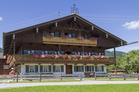Traditional farmhouse with floral decoration in Bad Wiesseeのeditorial素材
