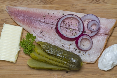 Smoked trout fillet on wooden sandwich board