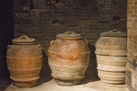 Old traditional clay jars used for storing olive oilの写真素材