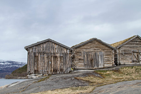  wooden huts  built on rock slabs  at Sorfoldafjordの写真素材