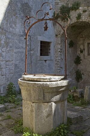 Old draw well in Kran, a small idyllic village situated inland of the Istrian peninsulaの写真素材