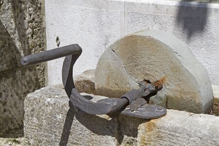 Old whetstone was still manually operated by crank