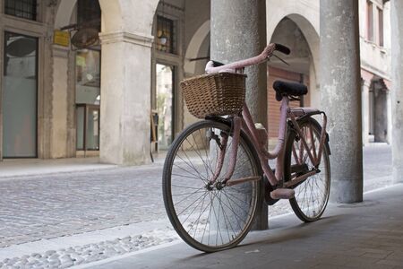 Ladies' bike with pink woolen clothingの写真素材