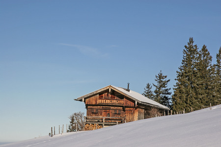 The idyllic Bodenschneid hut in the Mangfall mountains  passes through the ascent to the Bodenschneid summitの写真素材