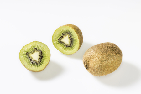 Kiwis are green to yellow, roundish with a diameter of three to six centimeters and are very vitamin-rich.の写真素材