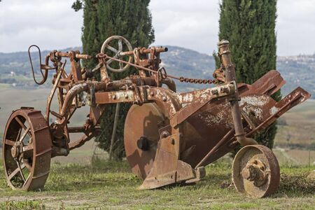 An old plow, an agricultural implement for loosening and for plowing of the soil is necessaryの写真素材