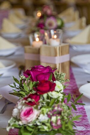 Festive table in a dining room during a wedding reception