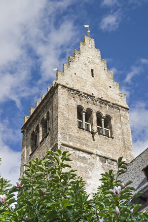 The tower of the Roman Catholic parish church of St. Hippolyt in Zell am Seeの写真素材