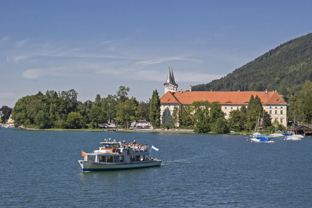 The excursion boat passes the famous Tegernsee monastery on the lake of the same name