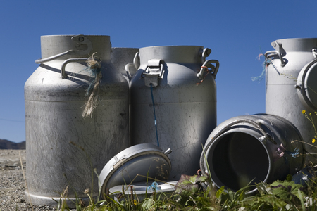 The milk car was there - emptied milk churns not far from a mountain hut in Tyrolの写真素材