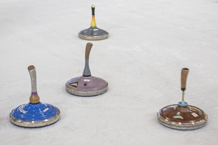 A popular winter sport for many is curling whether on frozen lakes or in the ice rinkの写真素材