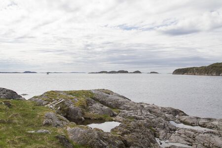 Bad weather day on the Norwegian Atlantic coast at Tennfjord on Eiterfjordenの写真素材