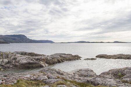 Bad weather day on the Norwegian Atlantic coast at Tennfjord on Eiterfjordenの写真素材