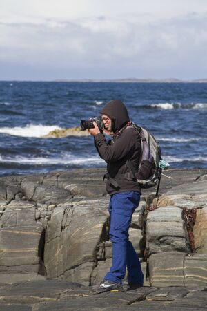 A stormy day on the rocky Atlantic coast of the island of Tustna in central Norwayの写真素材