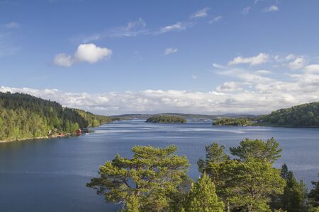 The bridge that connects the Aure and the island world of Tustna gives us a wonderful view of the fjordの写真素材