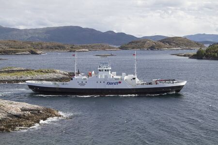 The ferry across the Talgsjoen takes locals and tourists from Kristiansund to Tustna or vice versaの写真素材