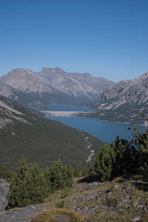 Lago Cancano, and Lago di San Giacomo, - two lonely reservoirs in the Stelvio National Park seen from aboveの写真素材