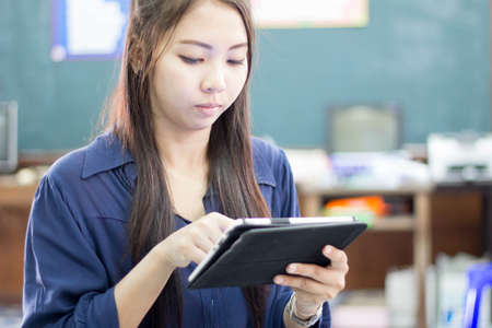 asia thai woman using tabletの写真素材