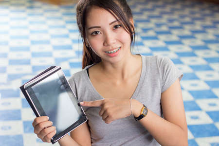 asia thai woman using tablet
