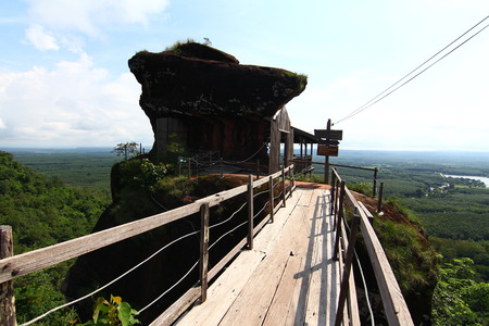 Phu Thok, travel in Thailand. Wooden ladder on the side of the rocky mountains.の写真素材
