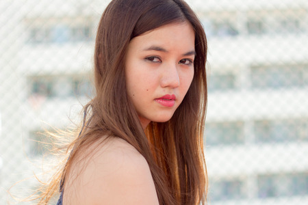 Portrait of thai adult beautiful girl relax time.の写真素材