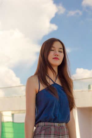 Portrait of thai adult beautiful girl relax time.の写真素材