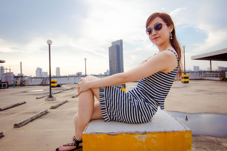 Portrait of thai adult businesswoman beautiful girl relax and smile.の写真素材